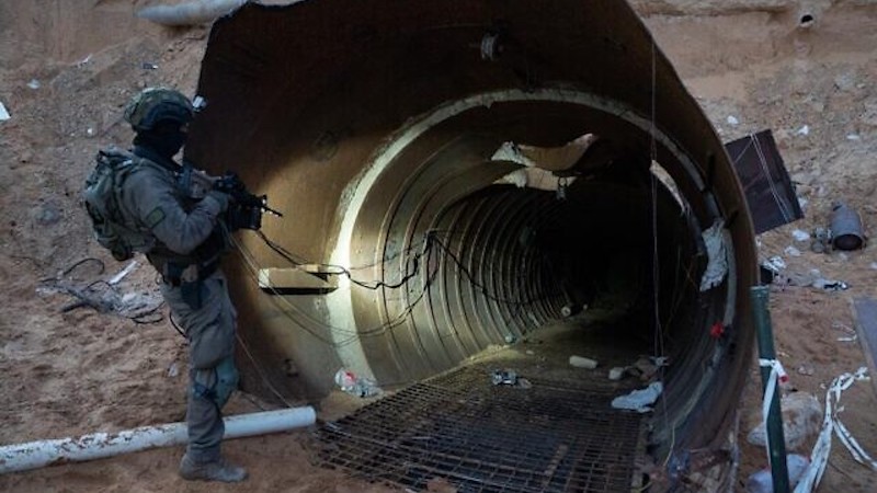 Israeli soldier at entrance of Hamas tunnel in Gaza. Photo Credit: IDF