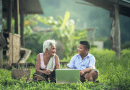 grandmother child boy laptop Asia