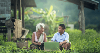 grandmother child boy laptop Asia