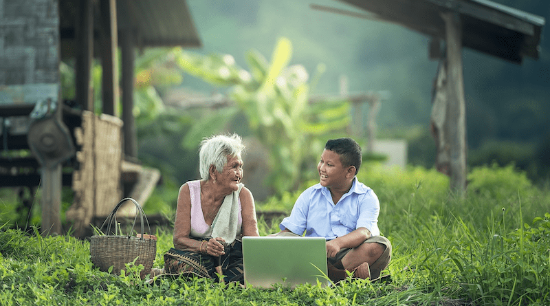 grandmother child boy laptop Asia