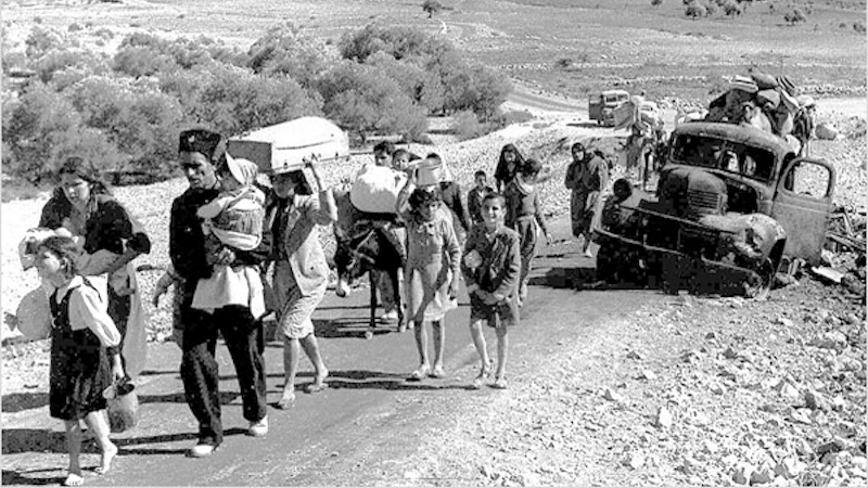 Palestine refugees (British Mandate of Palestine - 1948). "Making their way from Galilee in October-November 1948". Photo Credit: Fred Csasznik, Wikimedia Commons, Nakba