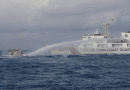 A China Coast Guard vessel fires a water cannon at a Philippine boat, Dec. 10, 2023. Photo Credit: Handout/Philippine Coast Guard