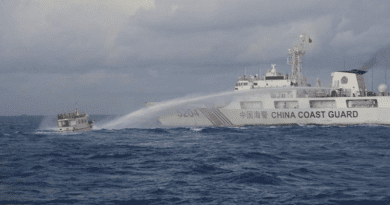 A China Coast Guard vessel fires a water cannon at a Philippine boat, Dec. 10, 2023. Photo Credit: Handout/Philippine Coast Guard