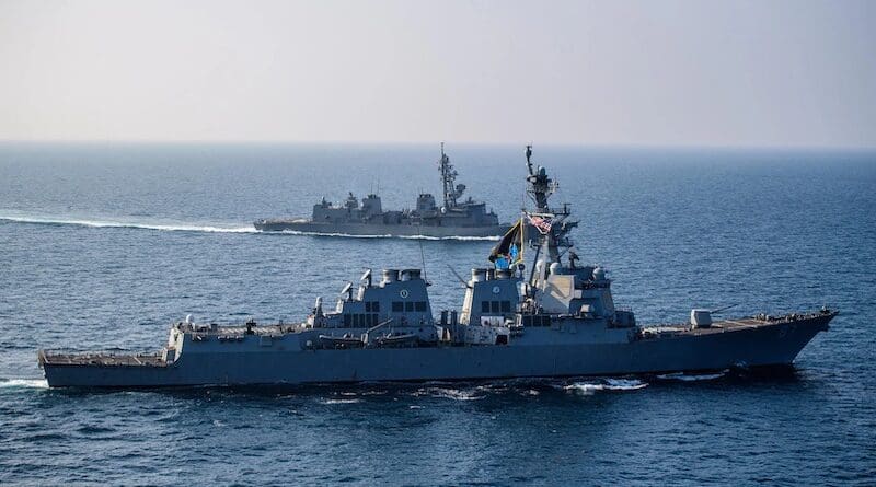 The guided-missile destroyer USS Mason sails alongside the Japanese destroyer Akebono in the Gulf of Aden. Photo Credit: Petty Officer 3rd Class Samantha Alaman
