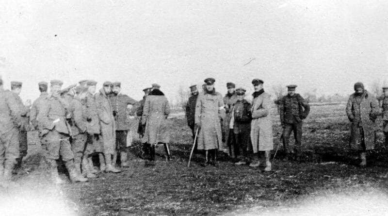 British and German troops meeting in no man's land during the unofficial truce (British troops from the Northumberland Hussars, 7th Division, Bridoux–Rouge Banc Sector). Photo Credit: Robson Harold B, Wikipedia Commons