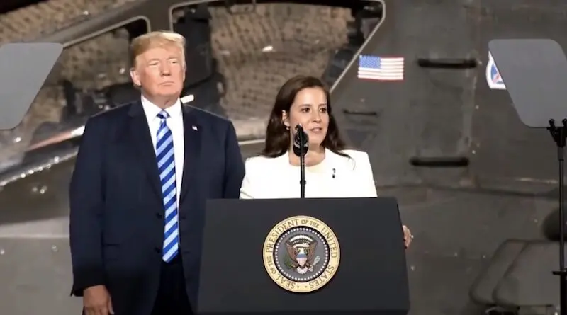 File photo of Elise Stefanik and President Donald Trump at Fort Drum in August 2018. Photo Credit: Office of Congresswoman Elise Stefanik, Wikipedia Commons