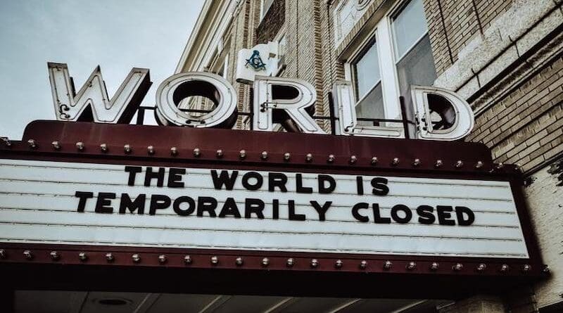 A theater marquee notes the shuttering of businesses and public activity during the COVID-19 pandemic. CREDIT: Edwin Hooper/Unsplash