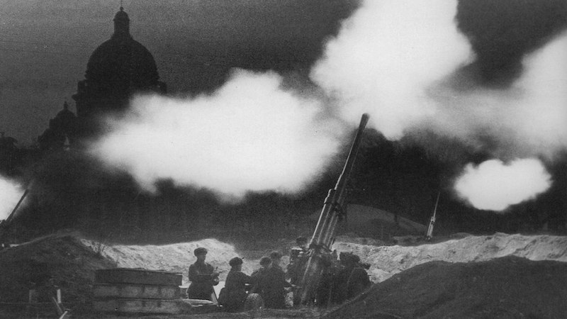 The fire of anti-aircraft guns deployed in the neighborhood of St. Isaac's cathedral during the defense of Leningrad (now called St. Petersburg, its pre-Soviet name) in 1941. Photo Credit: Boris Kudoyarov - "The Eastern Front in Photographs", John Erickson, Wikipedia Commons