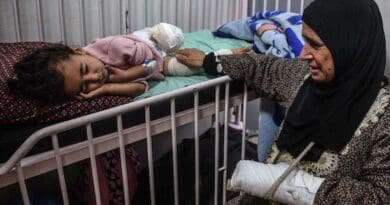 A mother cares for her daughter at Nasser Hospital in Khan Younis in the south of Gaza. Photo Credit: © UNICEF/Abed Zaqout