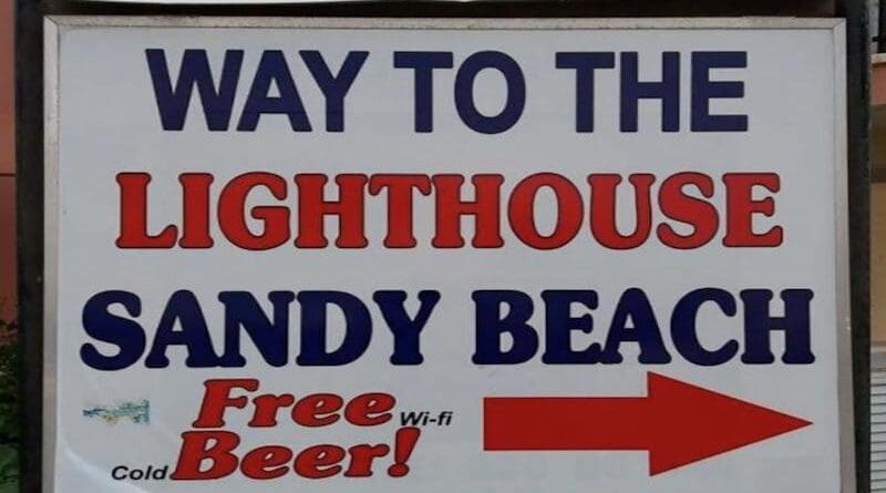 One of the tricky photos the researchers used in the study. At first glance the sign appears to read "Free Beer!", but on closer inspection it reads "Free Wi-fi, Cold Beer!" CREDIT: Image provided by Mengqi Liao and S. Shyam Sundar