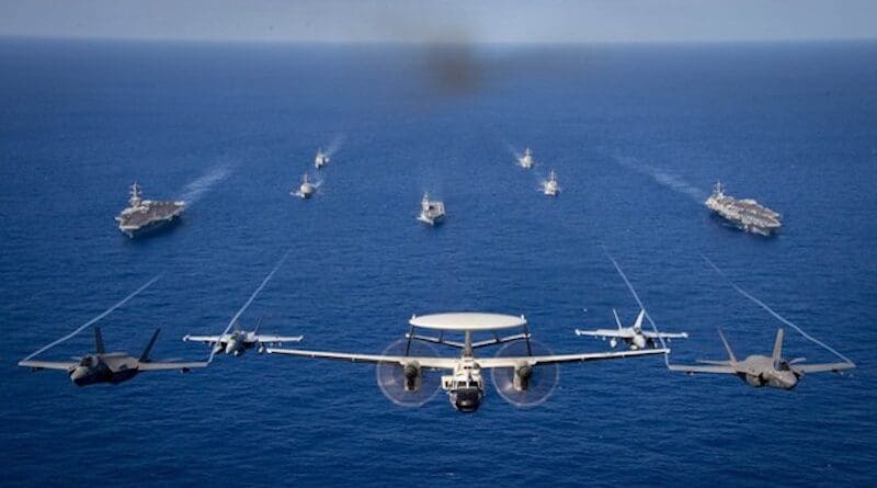Airplanes and ships from U.S. and Japanese navies stage a joint drill in the Philippine Sea. Photo Credit: US Navy