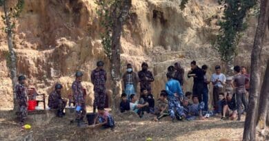 Members of the Myanmar junta-affiliated Border Guard Police (BGP) are seen at a Bangladesh Border Guard encampment in Bandarban, Bangladesh, after they fled from fighting across the border in Myanmar, Feb. 5, 2024. Photo Credit: Minhaz Uddin/BenarNews