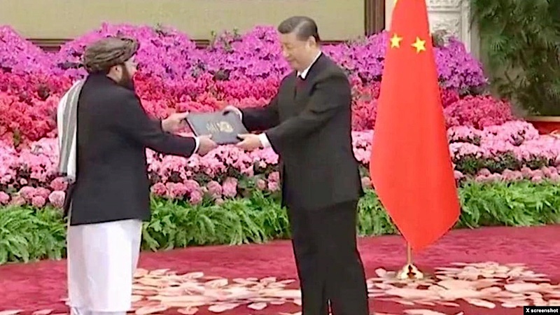 The Taliban's ambassador to China, Asadullah Bilal Karimi, left, is seen presenting his credentials to Chinese President Xi Jinping, in a photo posted on X Jan. 30, 2024, by Abdul Qahar Balkhi, spokesperson of the Taliban's foreign ministry. Credit: VOA