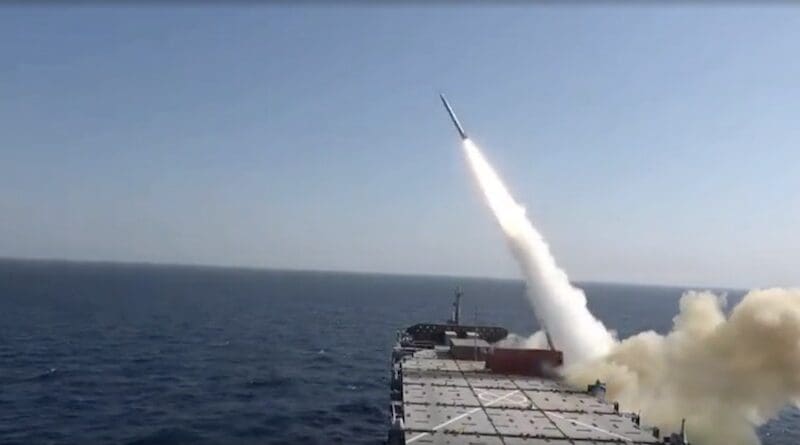 Iran's Islamic Revolution Guards Corps (IRGC) test fires a long-range ballistic missile from a military vessel. Photo Credit: Tasnim News Agency video screenshot