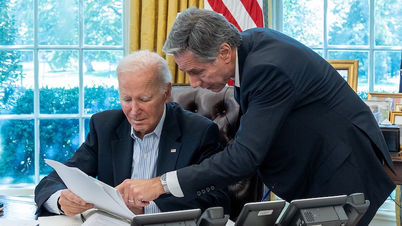 President Joe Biden, joined by Secretary of State Antony Blinken and Jon Finer, is briefed on the terrorist assault on Israel, Saturday October 7, 2023, in the Oval Office of the White House. (Official White House Photo by Cameron Smith)