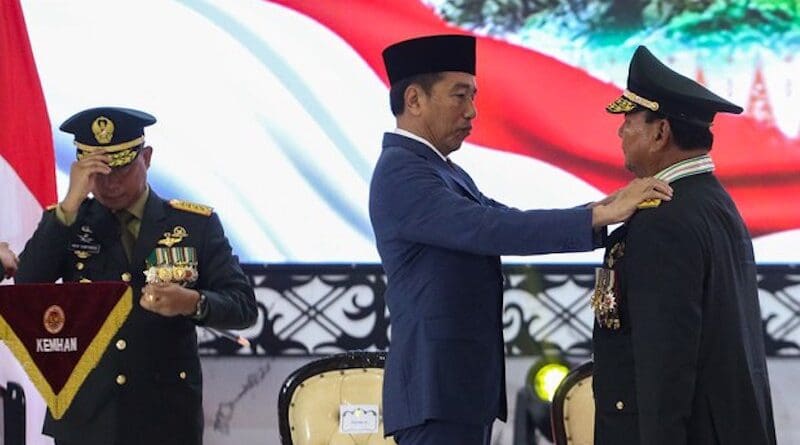 President Joko Widodo awards Defense Minister Prabowo Subianto the honorary rank of four-star general at a meeting of military and police leaders at army headquarters in Jakarta, Indonesia, on Wednesday, Feb. 28, 2024. Photo Credit: Eko Siswono Toyudho/BenarNews