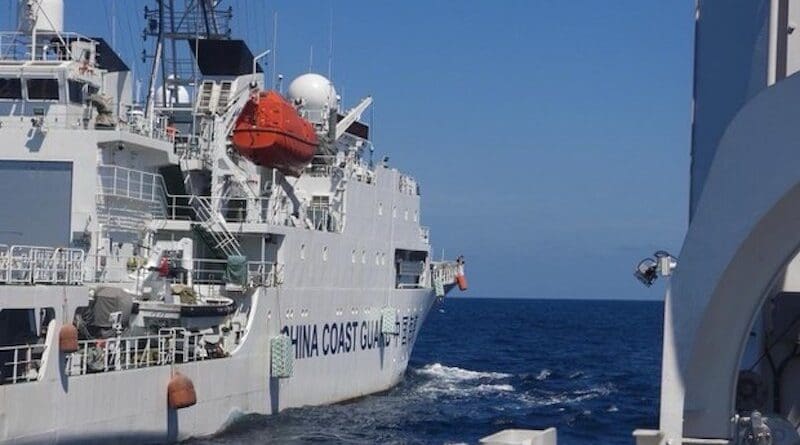 A China Coast Guard ship attempts to cross paths with the BRP Teresa Magbanua near the Scarborough Shoal in this photo released by the Philippine Coast Guard, Feb. 8, 2024. Photo Credit: Handout/Philippine Coast Guard