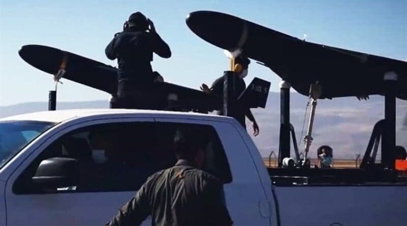 Iranian Islamic Revolution Guards Corps (IRGC) with drones. Photo Credit: Tasnim News Agency