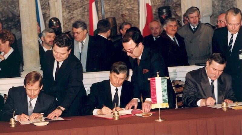 The Visegrád Group signing ceremony in February 1991. Václav Havel, József Antall and Lech Wałęsa. Photo Credit: Péter Antall, Wikipedia Commons