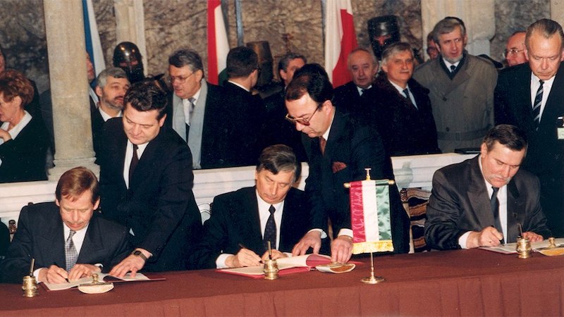 The Visegrád Group signing ceremony in February 1991. Václav Havel, József Antall and Lech Wałęsa. Photo Credit: Péter Antall, Wikipedia Commons