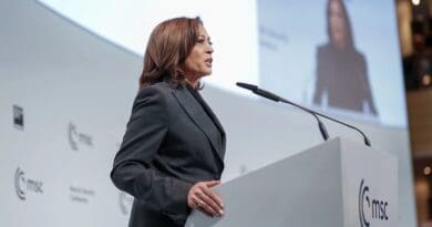 US Vice President Kamala Harris speaks at a podium during the 2024 Munich Security Conference in Munich, Germany. Photo Credit: DOD