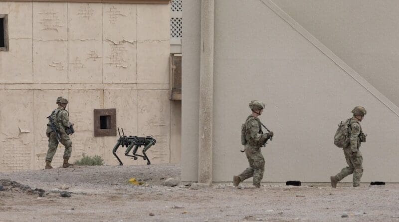 US Army light infantry company operating in a simulated urban environment while incorporating a robotic dog. Photo Credit: DOD