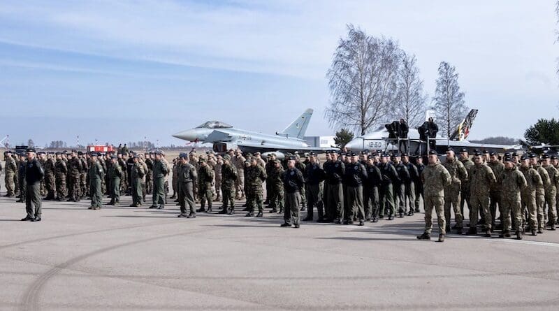 NATO formations were lined up in front of their jets as the Lithuanian President H.E. Gitanas Nausėda opened the ceremony at Šiauliai Air Base. Marking the handover of NATO's Baltic Air Policing mission after 20 consecutive years, the Belgian and French commanders handed the key to the Baltic Air Space over to the Spanish and Portuguese commanders when French Mirage 2000-5 fighters performed a fly past. NATO's senior representative, Admiral Joachim Rühle, Chief of Staff at Supreme Headquarters Allied Powers Europe, and the Chief of Defence of the Republic of Lithuania, General Valdemaras Rupsys during the event. The Belgian Air Force was the first NATO detachment to begin the mission at Šiauliai in March 2004 under the command of Major General Harold Van Pee, who is today the Commander of NATO's Combined Air Operations Centre at Uedem, Germany, controlling Baltic Air Policing. Photos: Alfredas Pliadis (8) and Portuguese Air Force (1). Photo Credit: NATO