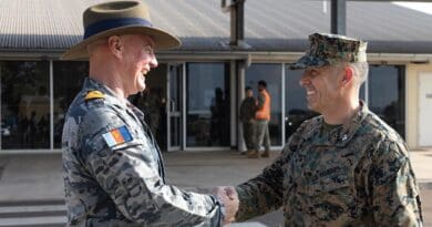 Marine Corps Col. Brian Mulvihill, right, the commanding officer of Marine Rotational Force–Darwin 24.3, shakes hands with Royal Australian Navy Capt. Mitchell Livingstone, the commanding officer of Headquarters Northern Command at Royal Australian Air Force Base Darwin, Northern Territory, Australia, March 24, 2024. Photo Credit: Marine Corps Sgt. Cristian L. Bestul