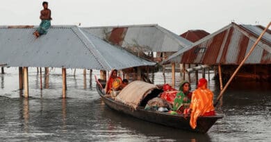 Flooded homes in Bangladesh. The Asia Pacific region is reversing on climate action, stagnant on clean energy. Copyright: Muhammad Amdad Hossain / WMO