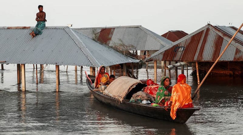 Flooded homes in Bangladesh. The Asia Pacific region is reversing on climate action, stagnant on clean energy. Copyright: Muhammad Amdad Hossain / WMO