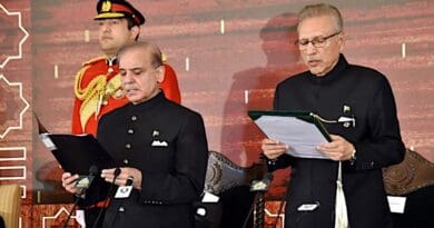 In this handout photograph taken and released by the Pakistan President House on March 4, 2024, Pakistan's President Arif Alvi (2R) administers the oath to newly sworn-in Prime Minister Shehbaz Sharif (2L) at the President House in Islamabad. (Supplied)
