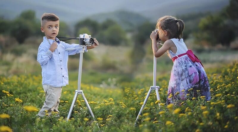 children cameras boy girl