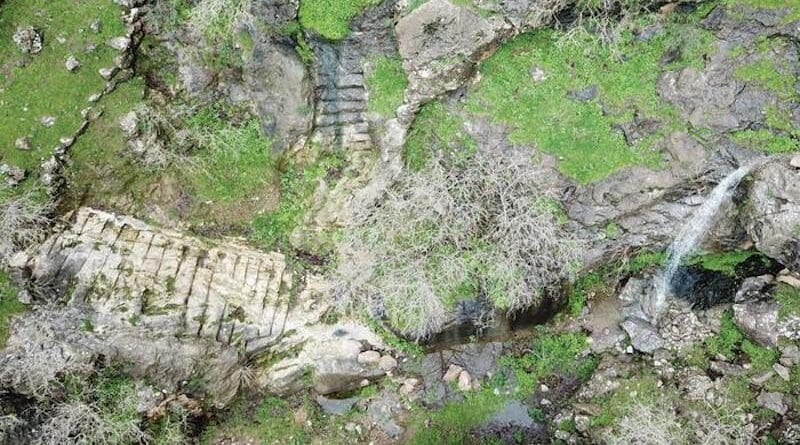 Ephemeral waterfall with main staircase and wadi (April 2019). CREDIT: Rabana-Merquly Archaeological Project