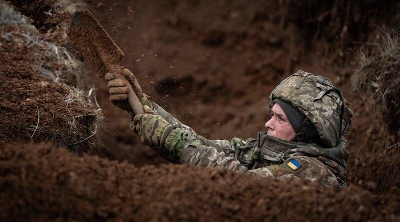 A Ukrainian soldier digs a trench. Photo Credit: Ukraine Defense Ministry