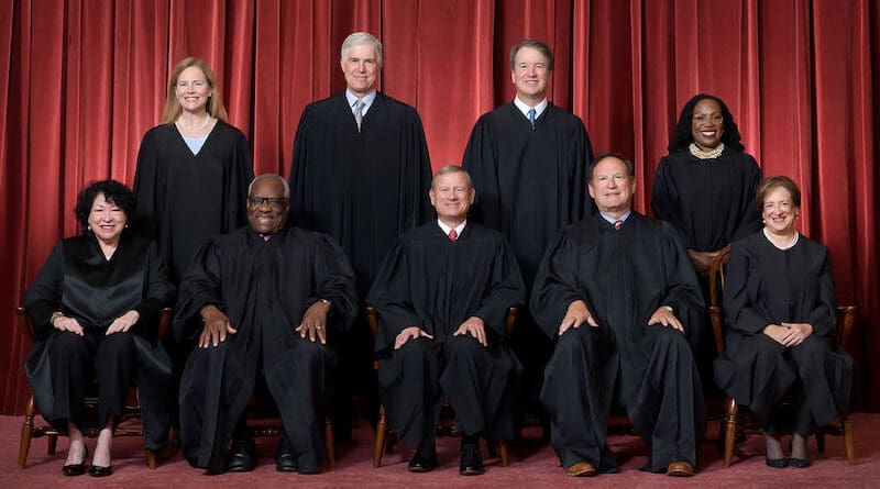 US Supreme Court justices since June 2022: Front row (left to right): Sonia Sotomayor, Clarence Thomas, Chief Justice John Roberts, Samuel Alito, and Elena Kagan. Back row (left to right): Amy Coney Barrett, Neil Gorsuch, Brett Kavanaugh, and Ketanji Brown Jackson. Photo Credit: Fred Schilling, Supreme Court, Wikipedia Commons