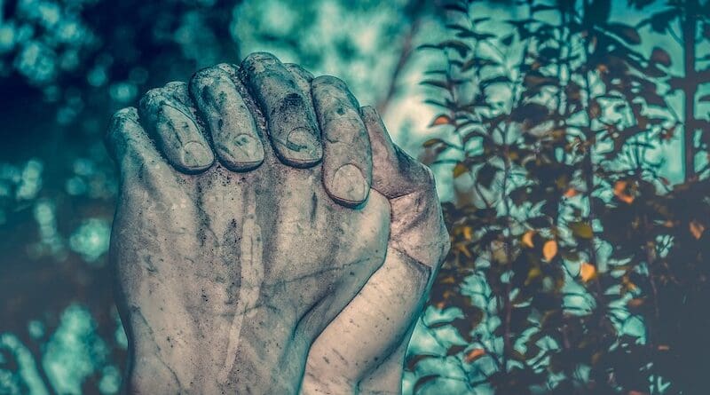 religion prayer hands sculpture