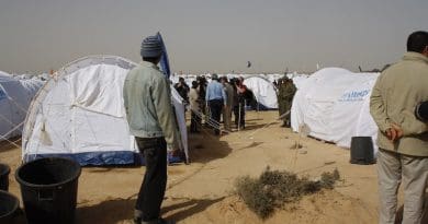 File photo of a transit camp for refugees near the Libyan-Tunisian border. Photo Credit: DFID - UK Department for International Development, Wikimedia Commons