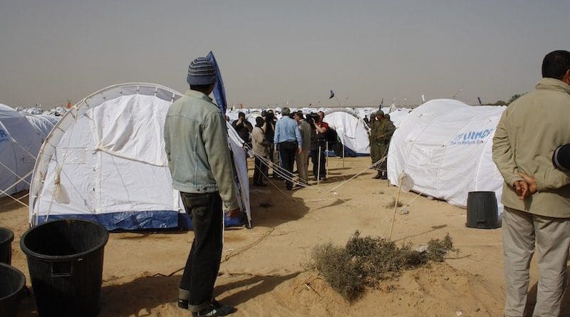 File photo of a transit camp for refugees near the Libyan-Tunisian border. Photo Credit: DFID - UK Department for International Development, Wikimedia Commons