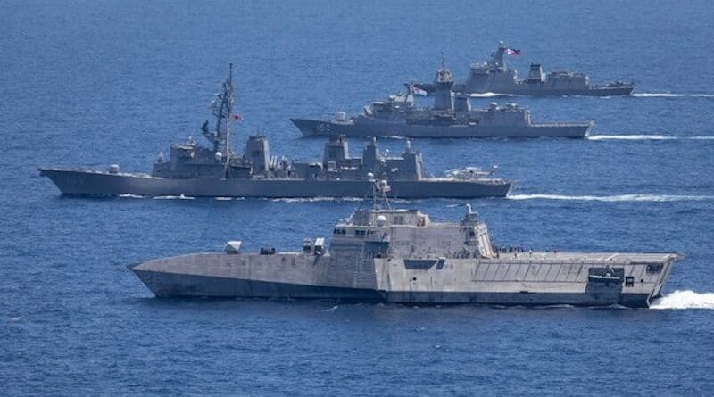 Naval ships from the U.S., Australia, Japan and the Philippines sail in formation off the coast within the Philippines Exclusive Economic Zone in the South China Sea, April 7, 2024. Photo Credit: Royal Australian Navy
