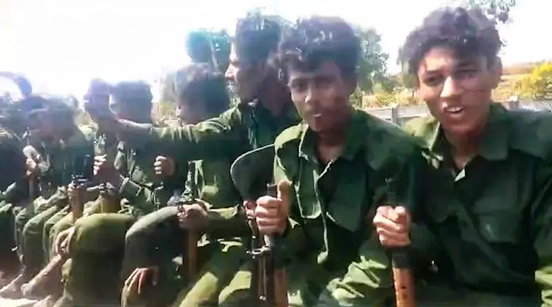 Rohingya Muslims ride in the back of a junta military vehicle, March 9, 2024. Photo Credit: Image from citizen journalist video, RFA Myanmar