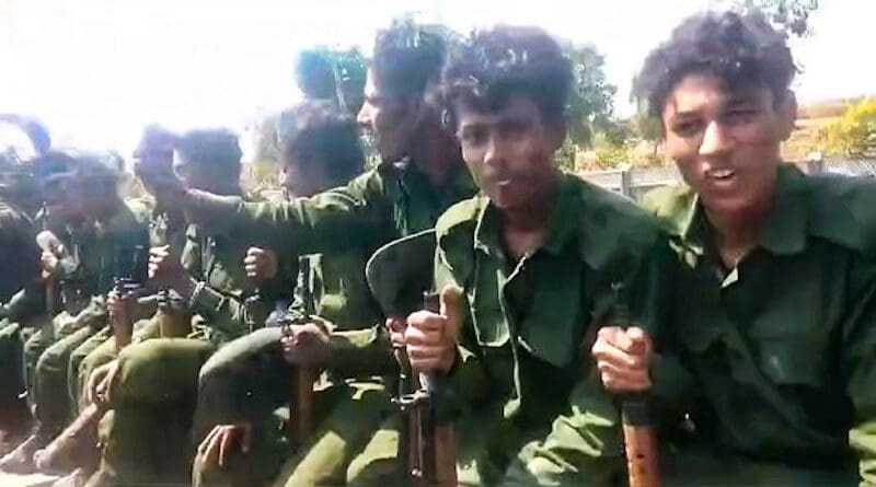 Rohingya Muslims ride in the back of a junta military vehicle, March 9, 2024. Photo Credit: Image from citizen journalist video, RFA Myanmar