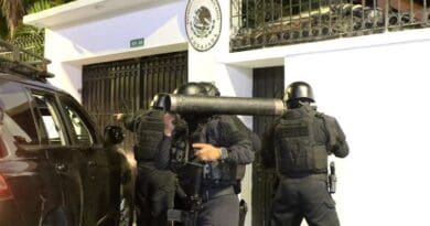 Ecuador’s security forces storme the Mexican embassy in Quito. Photo Credit: Tasnim News Agency