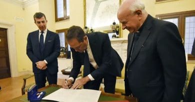 Chuck Robbins, the chief executive of the multinational digital communications conglomerate Cisco, signs the Rome Call for AI Ethics, a document by the Pontifical Academy for Life, on April 24, 2024, at the Vatican. | Credit: Vatican Media