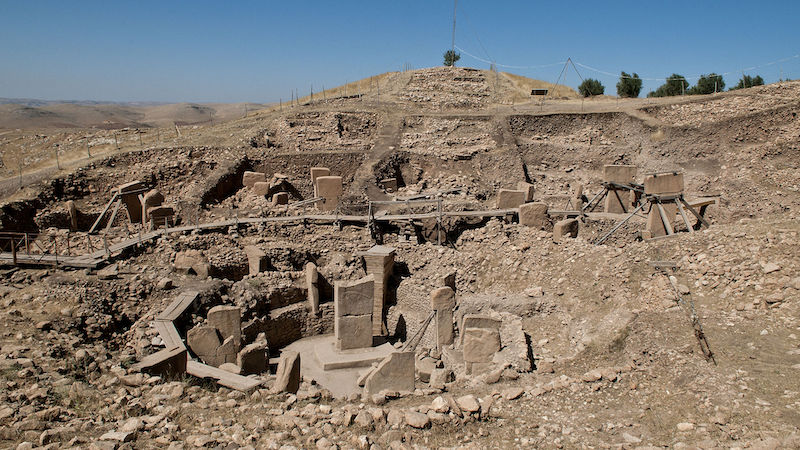 View overlooking the main excavation area of Göbekli Tepe. Photo Credit: Teomancimit, Wikipedia Commons