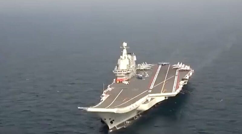 File photo of the Chinese CNS Shandong aircraft carrier in the South China Sea. Photo Credit: Screenshot China PLA Navy video
