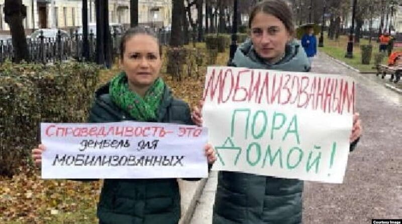 File photo of women in Moscow, Russia whose husbands have been mobilized to fight in Ukraine protest for them to be returned home. Photo Credit: RFE/RL