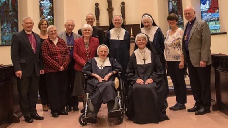 Anglican nuns from Sisterhood of Saint Mary (photographed with bishops from the Anglican Church of North America's Diocese of the Living Word) are among those suing the state of New York for requiring that they cover abortion in their health plans. | Credit: Photo courtesy of Becket Law