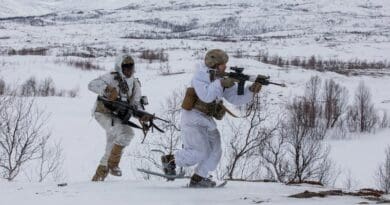 Soldiers of 1st Battalion, 501st Parachute Infantry Regiment, 2nd Infantry Brigade Combat Team (Airborne), 11th Airborne Division, move into position while practicing tactics during Exercise Arctic Shock 24 in Malselv, Norway. Photo Credit: DOD