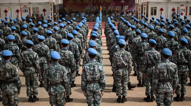 MINUSMA holds a medal parade for members of the Chinese contingent peacekeepers serving in Gao. UN Photo/Harandane Dicko