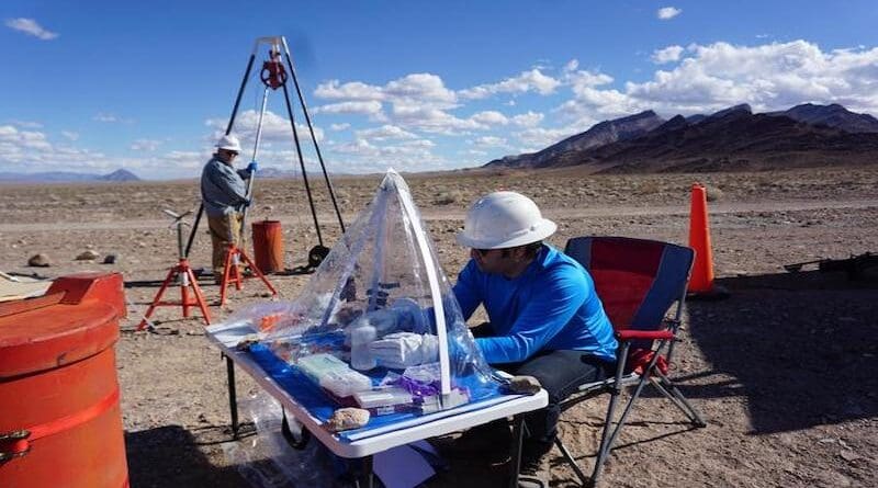 The Desert Research Institute team extracting samples from the bore hole at Death Valley. CREDIT: Duane Moser, Desert Research Institute